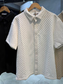 Camiseta de botão S Gold texturizada  229,99 Por 189,90