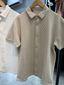 Camiseta de botão S Gold texturizada  229,99 Por 189,90