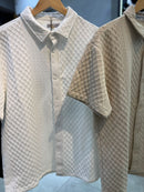 Camiseta de botão S Gold texturizada  229,99 Por 189,90